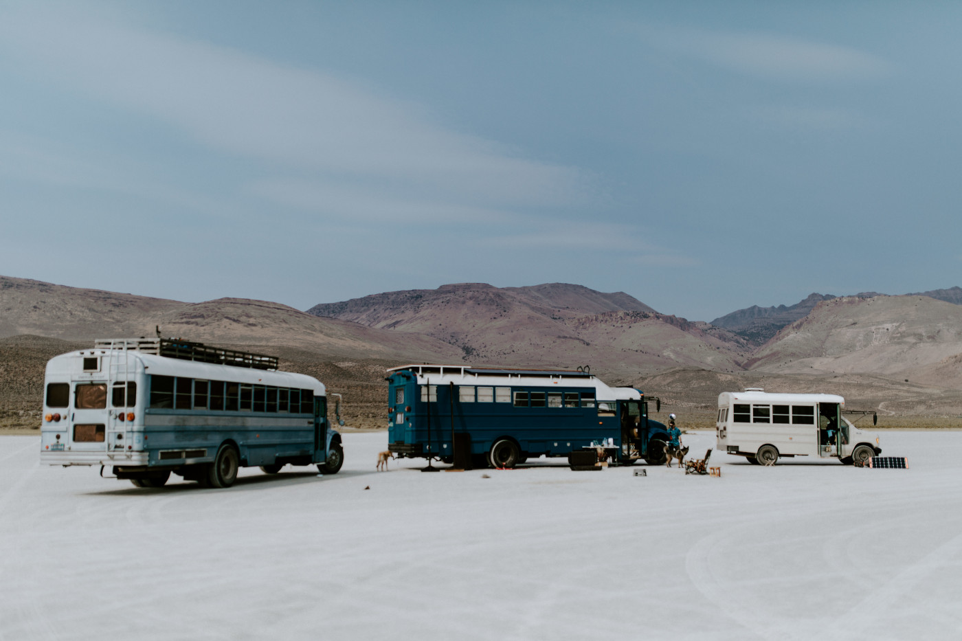 Emerald, Cameron, and their friends drove their converted school bus RVs out to the playa of Alvord Desert in Central Oregon.