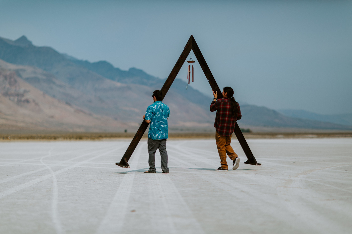 Cameron and his friend place the altar in the Alvord Desert.