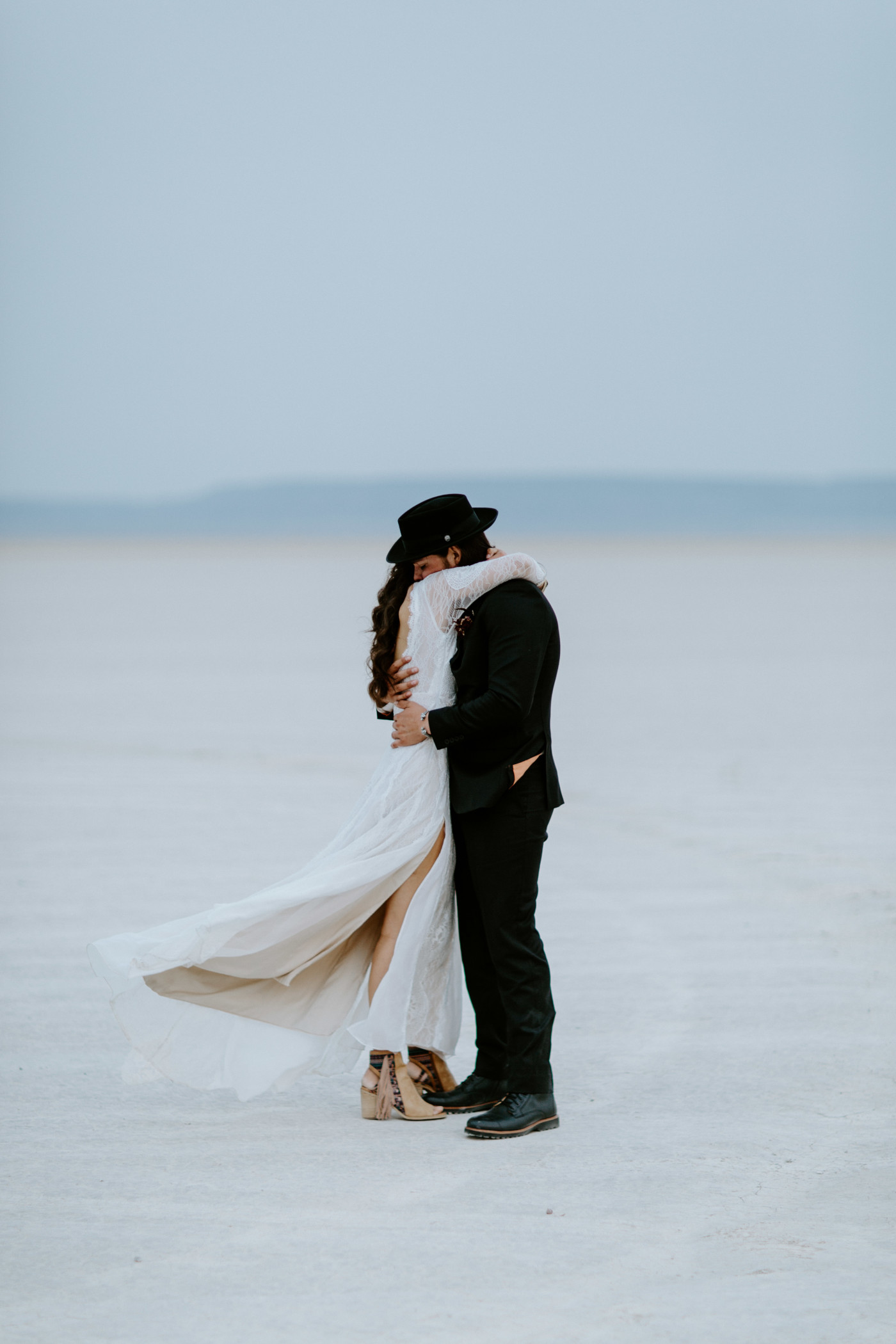 Cameron and Emerald hug during their first look at the playa in the Alvord Desert.