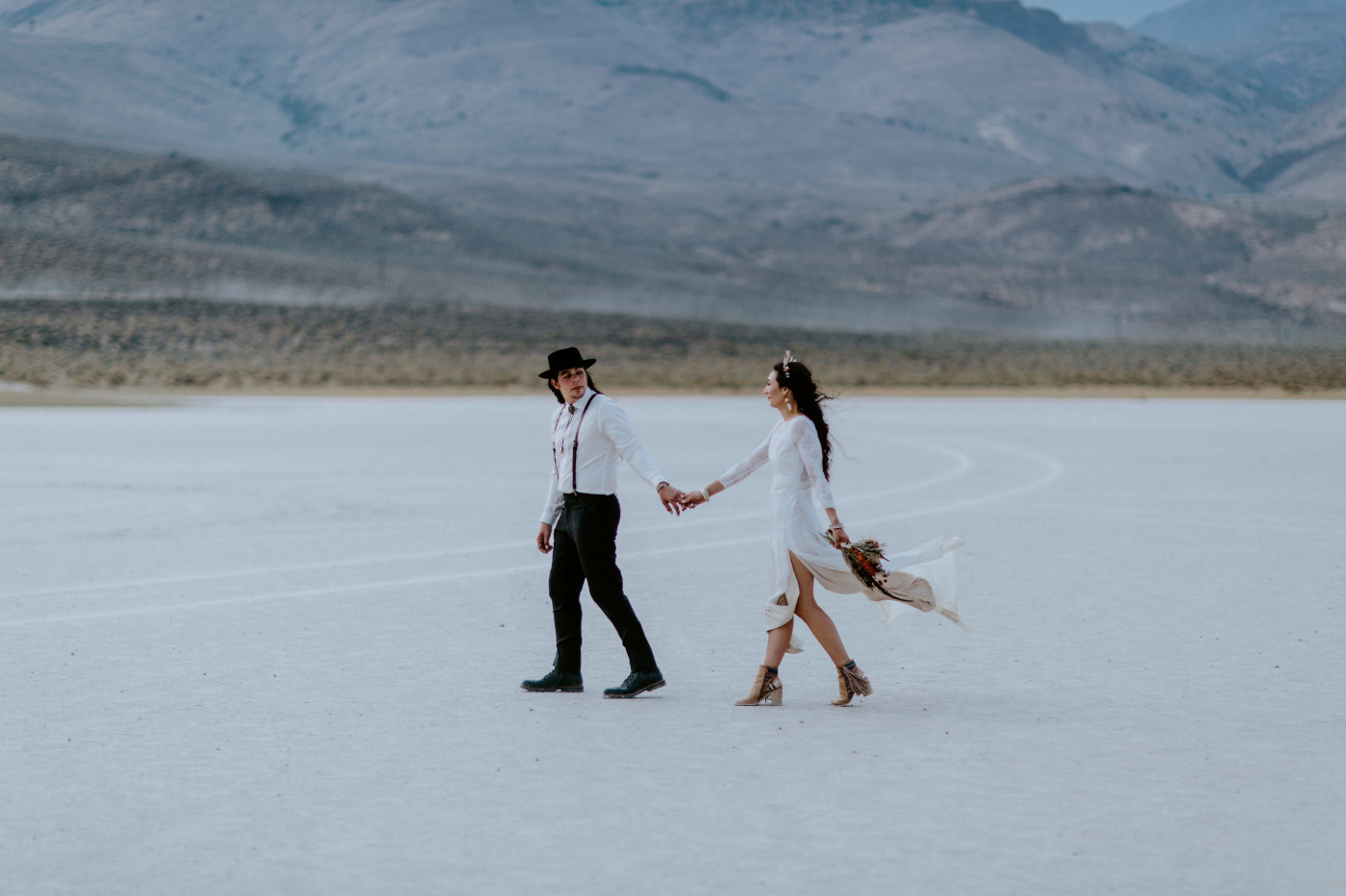Cameron and Emerald take a stroll through the Alvord Desert.