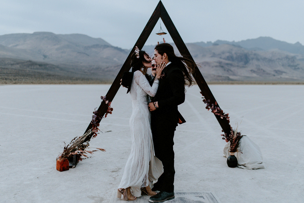 An animated gif of Emerald and Cameron going in for a first kiss during their elopement in the Alvord Desert.