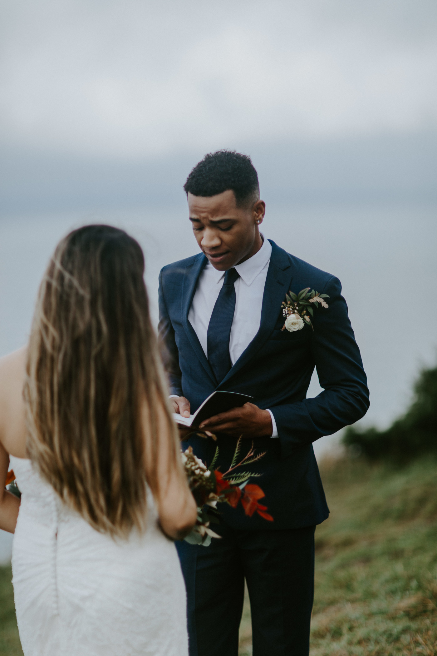 Deandre reads his vows during his elopement. Elopement photography at Mount Hood by Sienna Plus Josh.