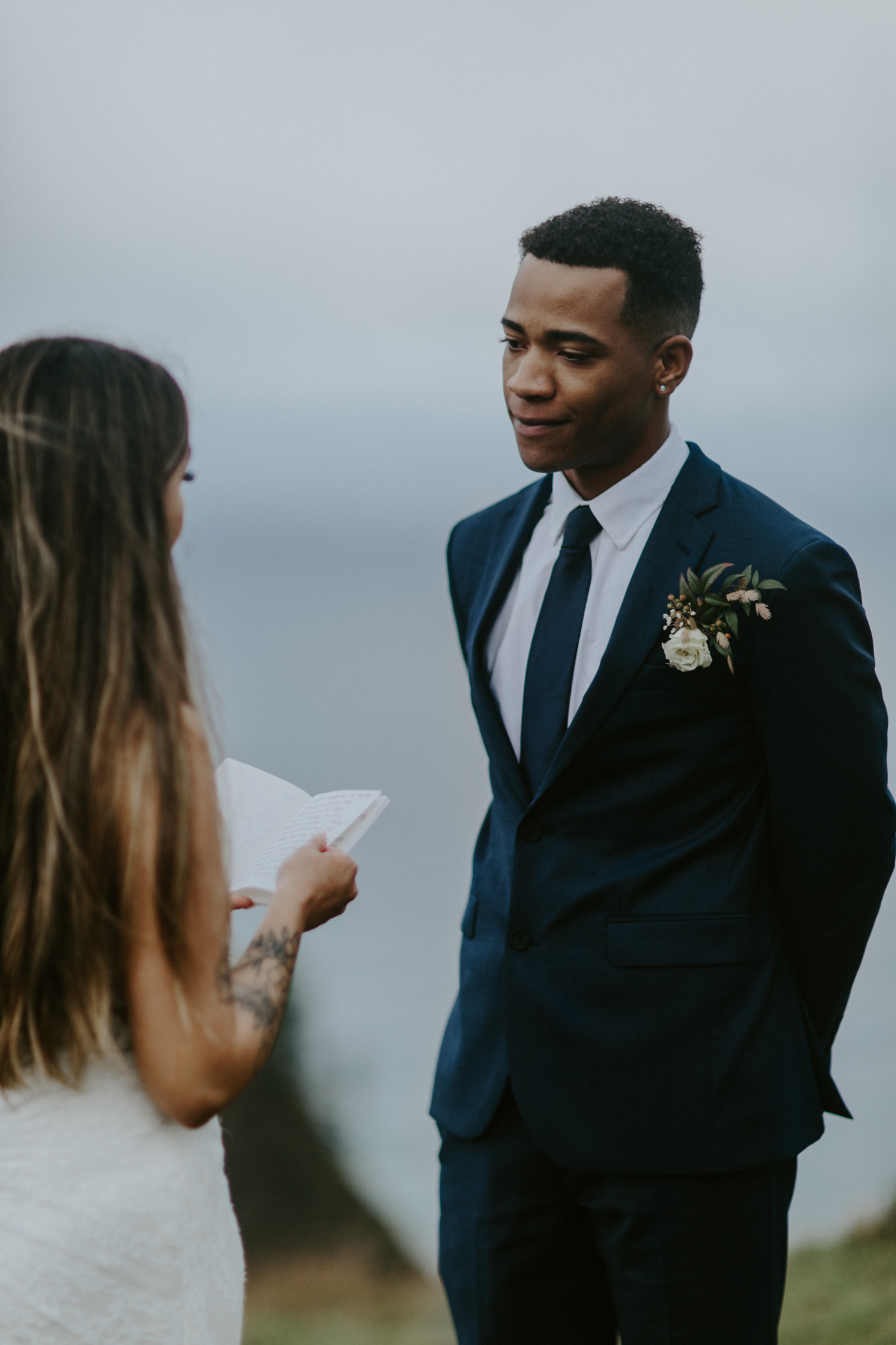 Deandre lists to Ariana. Elopement photography at Mount Hood by Sienna Plus Josh.
