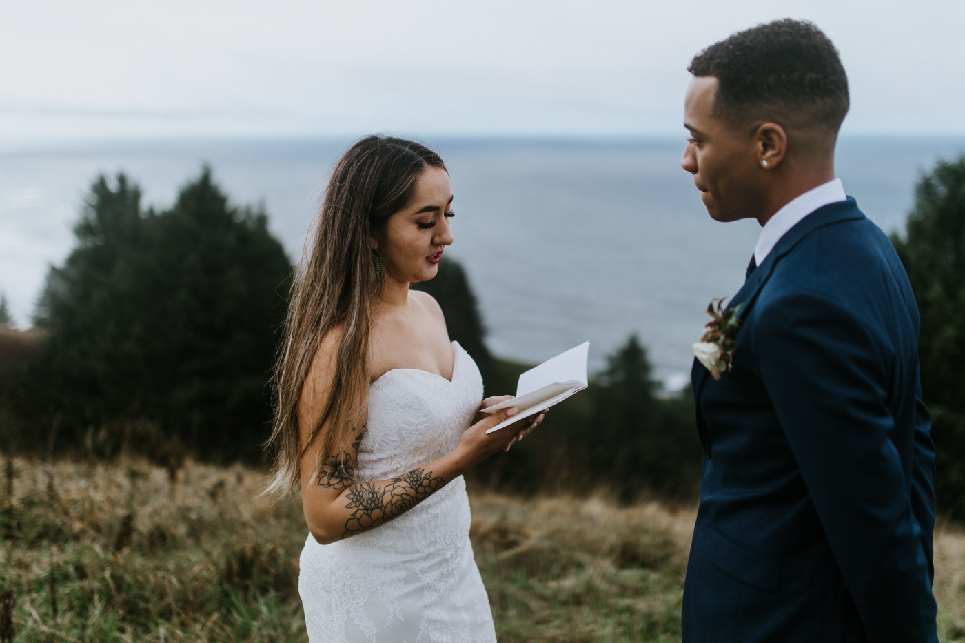 Ariana reads from her vow book. Elopement photography at Mount Hood by Sienna Plus Josh.