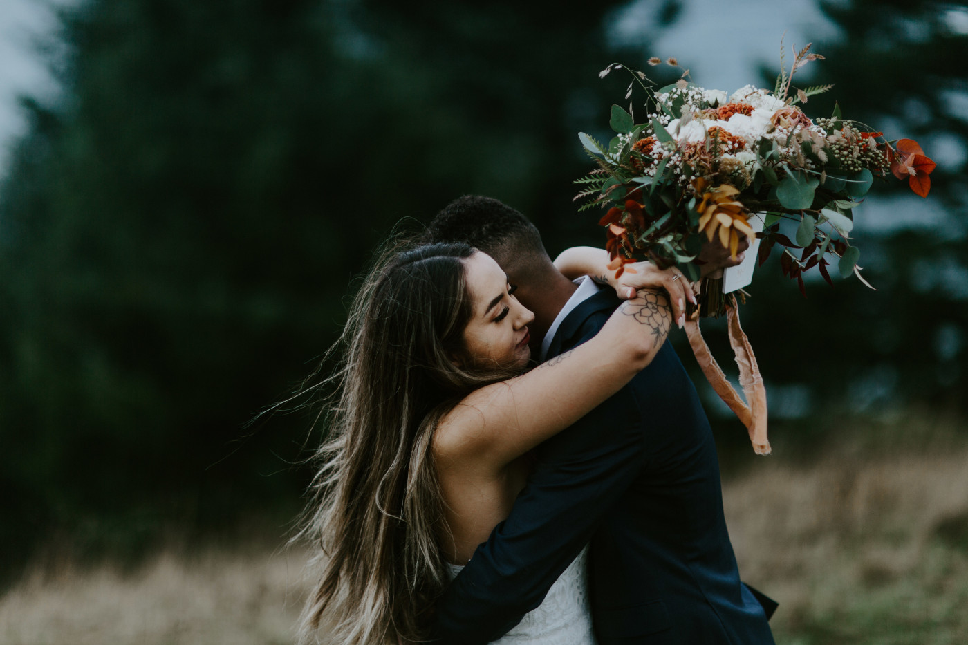 Deandre and Ariana hugging. Elopement photography at Mount Hood by Sienna Plus Josh.