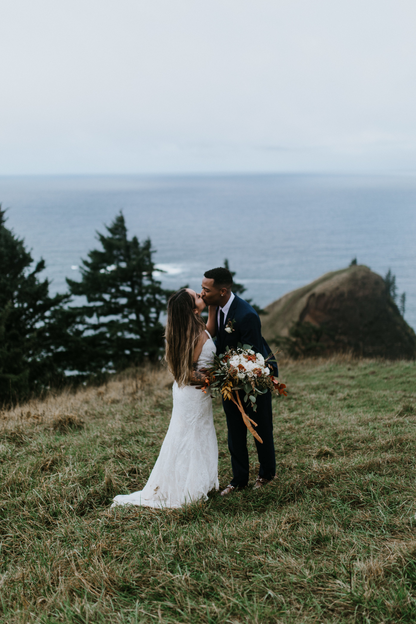 Deandre and Ariana kiss. Elopement photography at Mount Hood by Sienna Plus Josh.