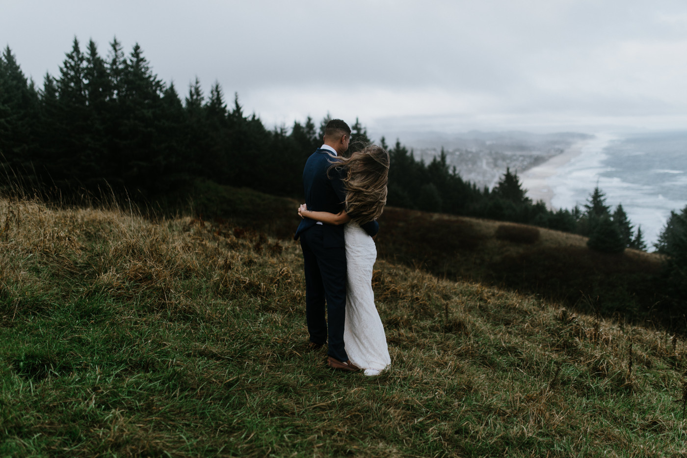 Deandre and Ariana hug. Elopement photography at Mount Hood by Sienna Plus Josh.