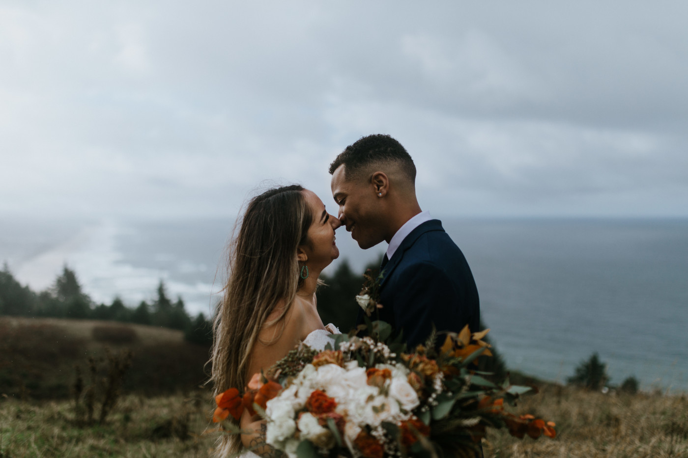 Deandre and Ariana stand face to face. Elopement photography at Mount Hood by Sienna Plus Josh.