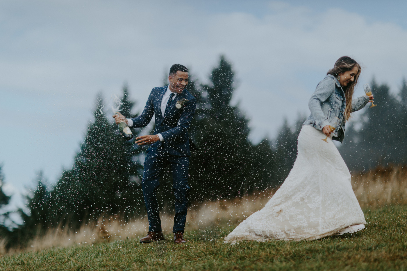 Ariana runs from the champagne. Elopement photography at Mount Hood by Sienna Plus Josh.