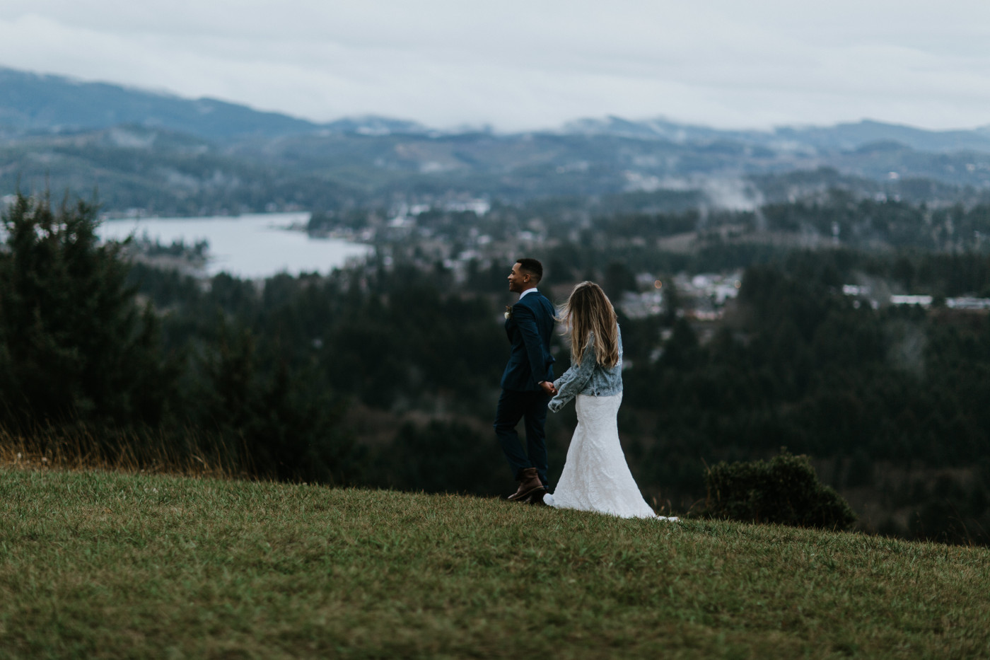 Margaux and Ariana walk hand in hand. Elopement photography at Mount Hood by Sienna Plus Josh.