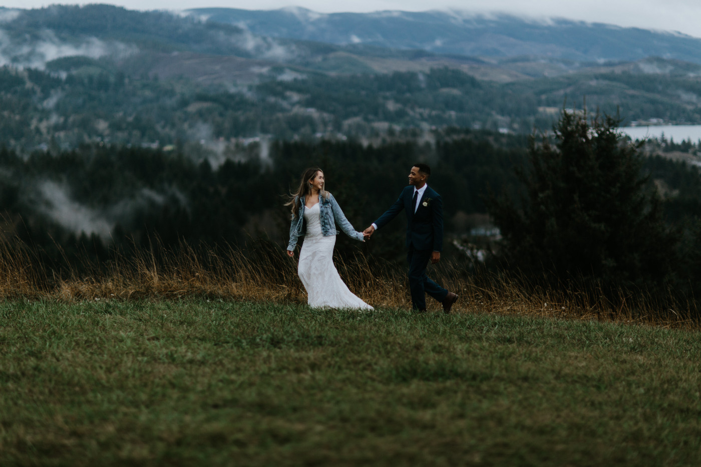 Ariana and Deandre walk hand in hand. Elopement photography at Mount Hood by Sienna Plus Josh.