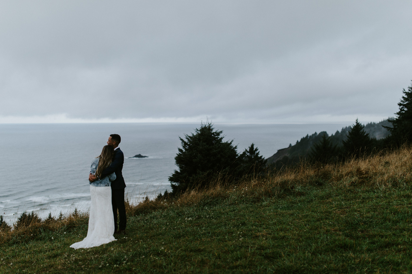 Ariana is held by Deandre. Elopement photography at Mount Hood by Sienna Plus Josh.