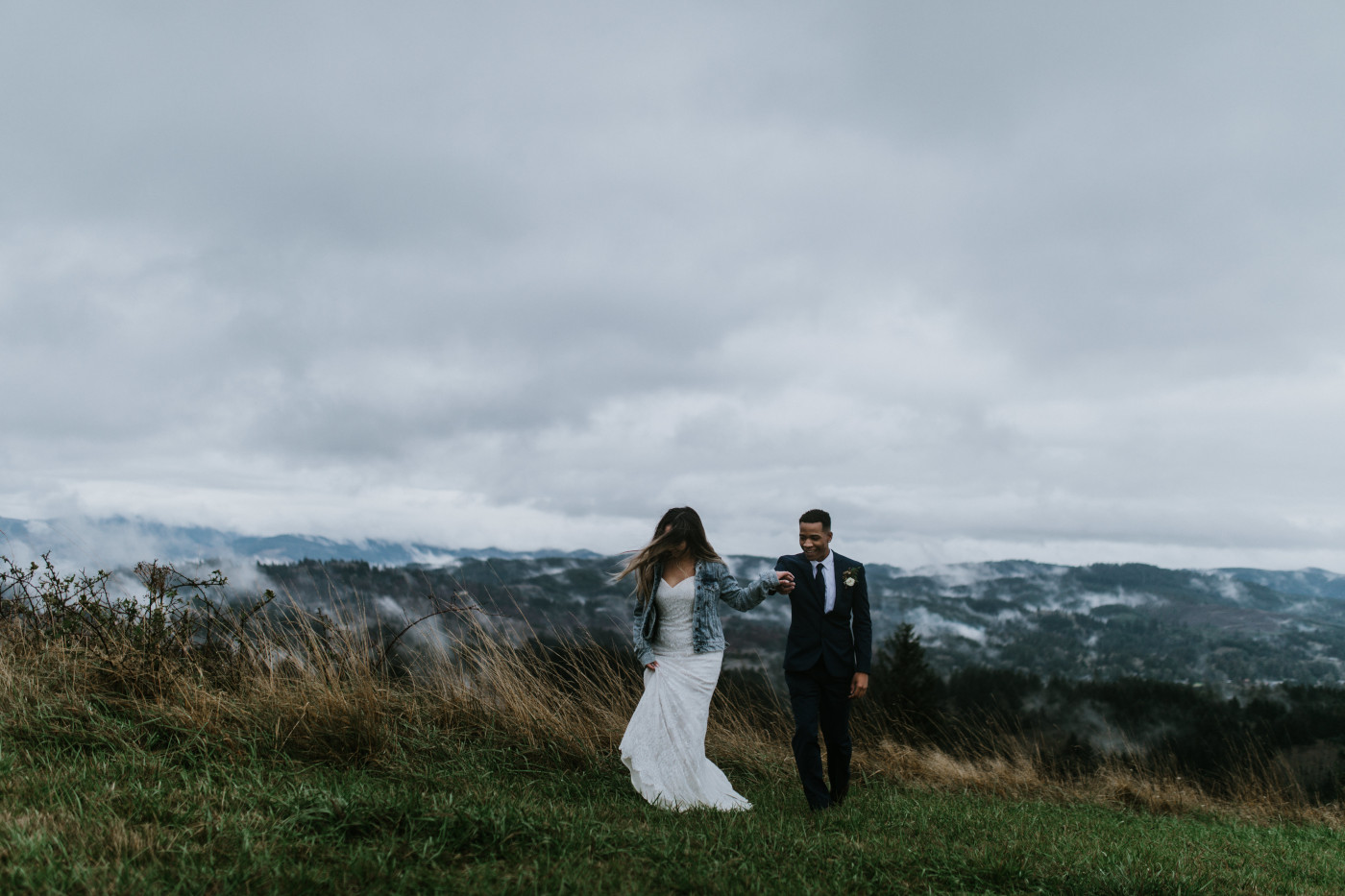 Ariana holds Deandre's hand as they walk. Elopement photography at Mount Hood by Sienna Plus Josh.