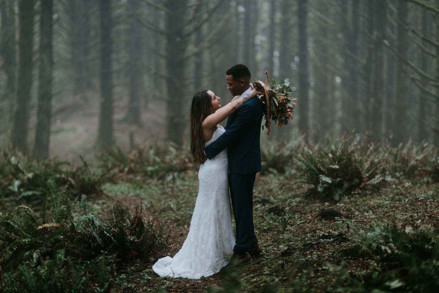 Ariana and Deandre hold each other. Elopement photography at Mount Hood by Sienna Plus Josh.