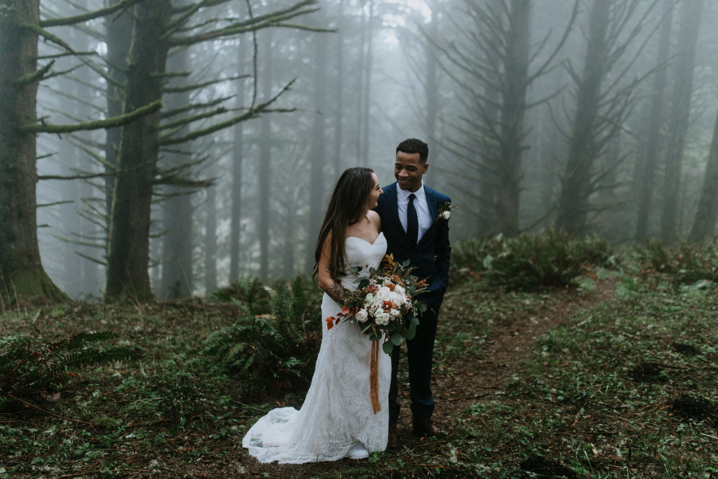 Ariana and Deandre walk side by side. Elopement photography at Mount Hood by Sienna Plus Josh.