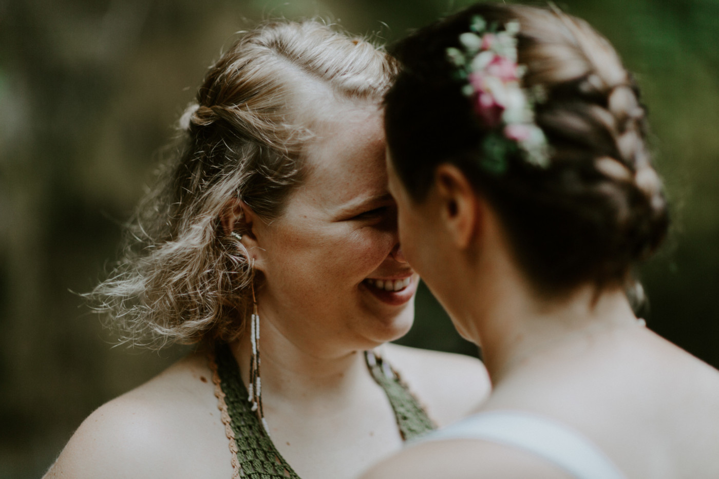 Kate and Audrey share a laugh. Elopement wedding photography at Bridal Veil Falls by Sienna Plus Josh.