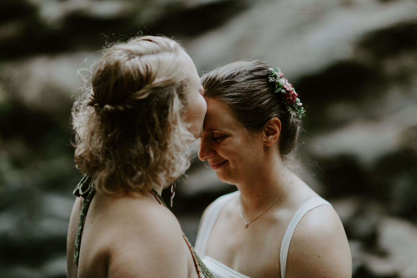 Kate kisses Audrey's head. Elopement wedding photography at Bridal Veil Falls by Sienna Plus Josh.