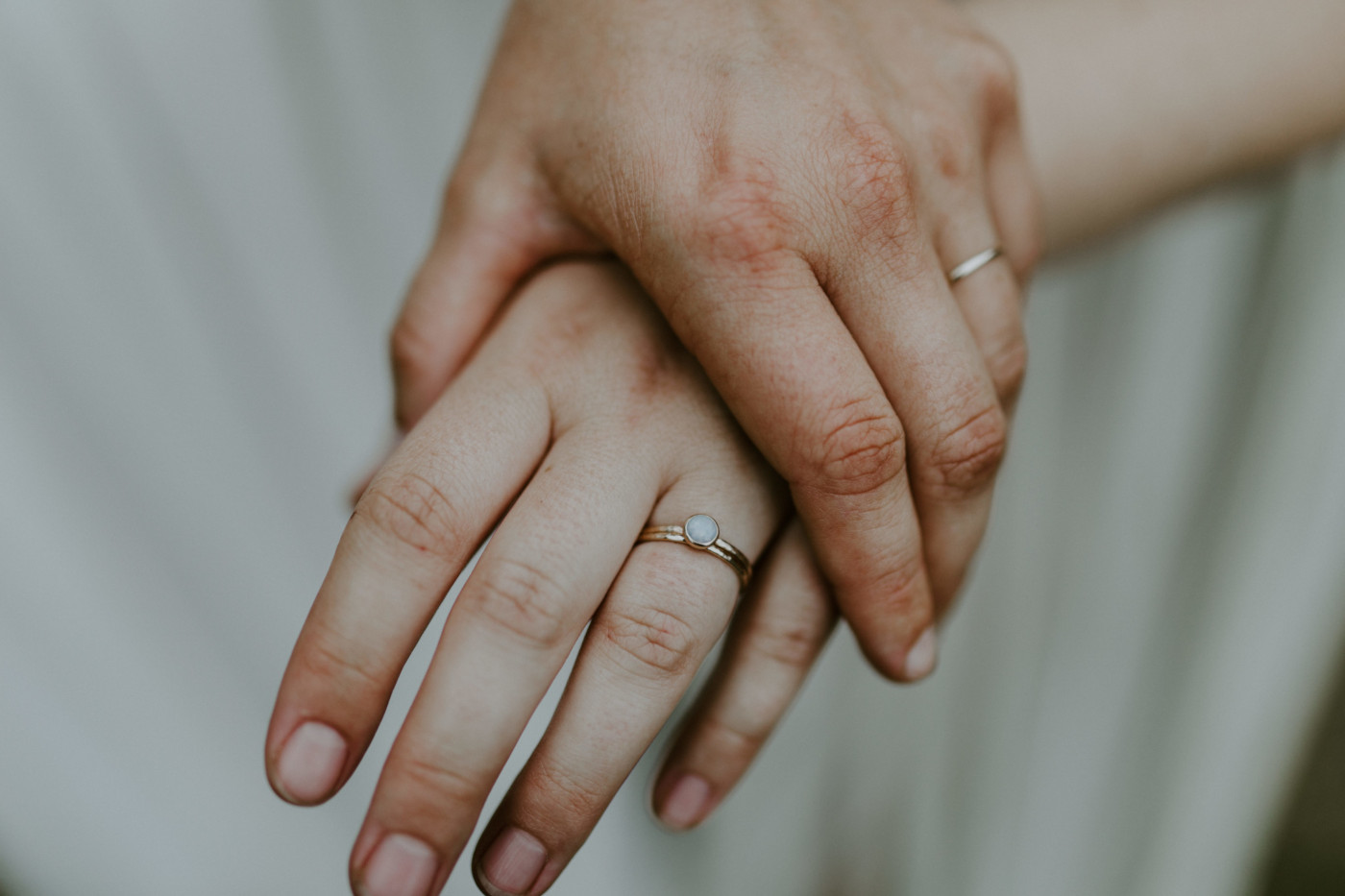 A close up of Audrey and Kate's rings. Elopement wedding photography at Bridal Veil Falls by Sienna Plus Josh.