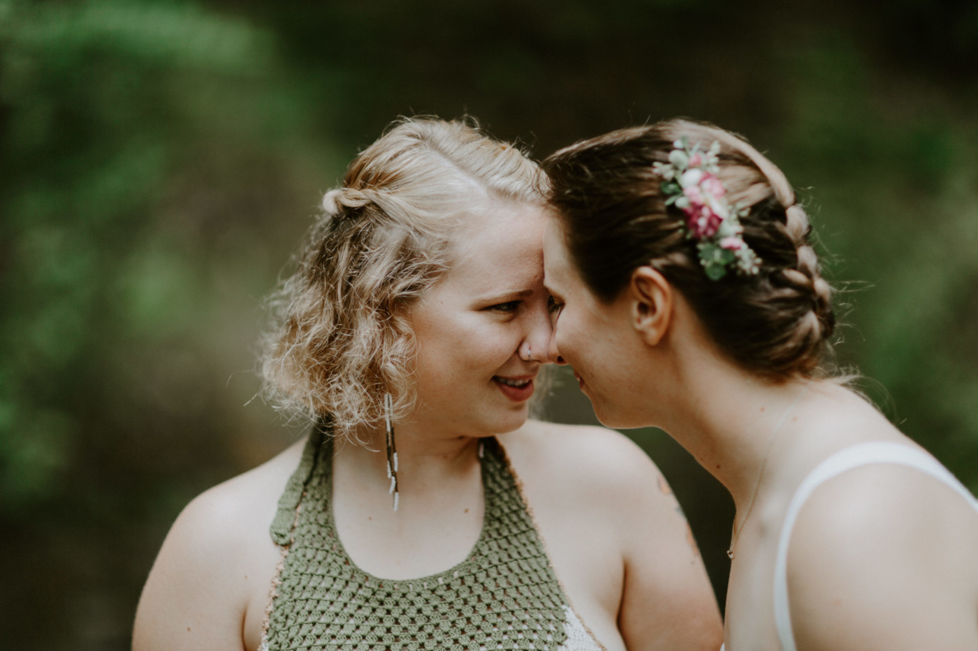 Audrey and Kate stand forehead to forehead. Elopement wedding photography at Bridal Veil Falls by Sienna Plus Josh.
