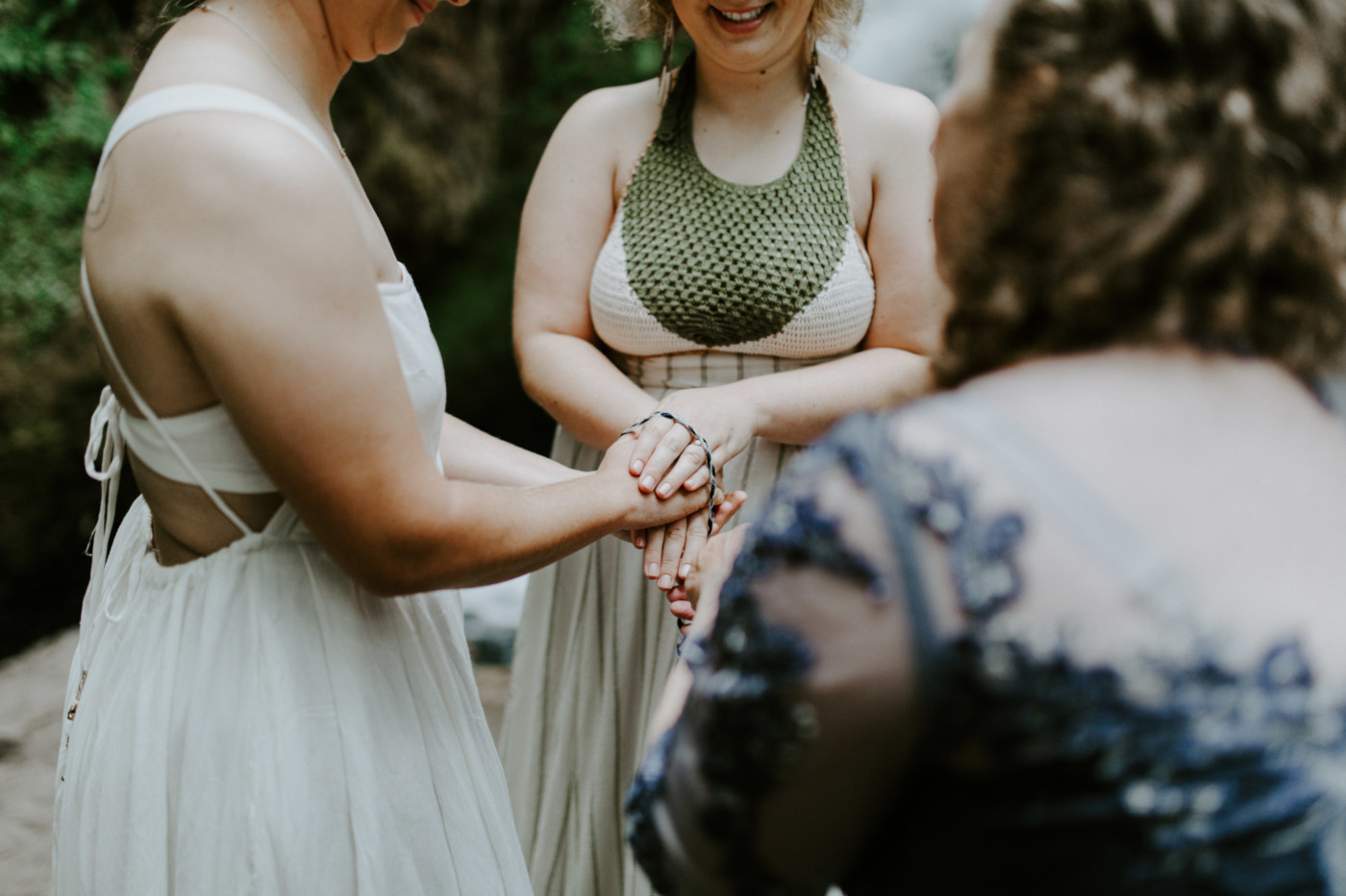 Audrey and Kate at their elopement ceremony. Elopement wedding photography at Bridal Veil Falls by Sienna Plus Josh.