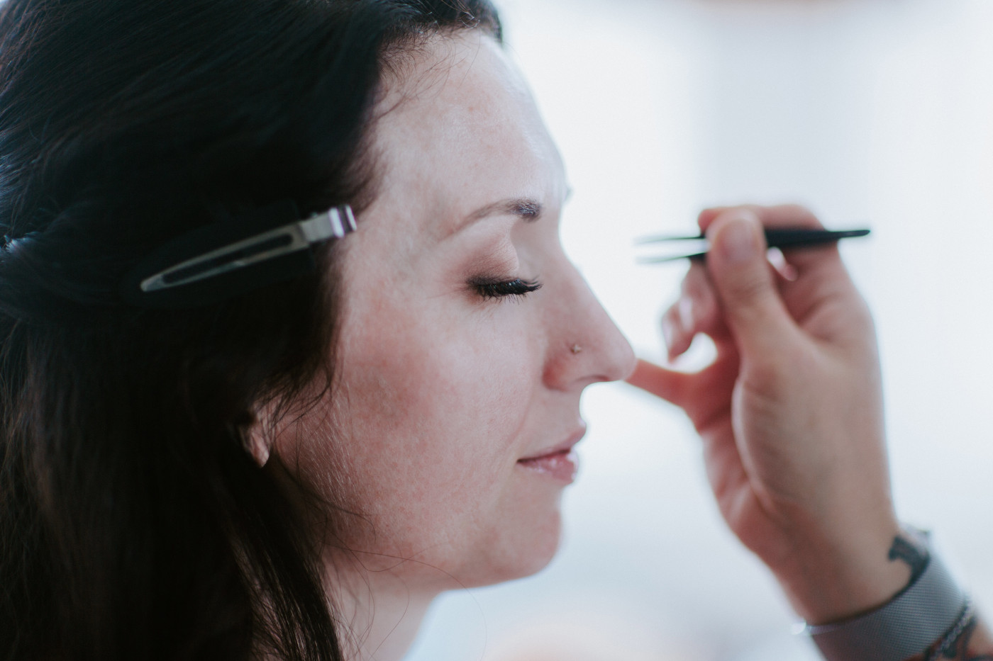 Hannah gets her makeup done for her elopement.