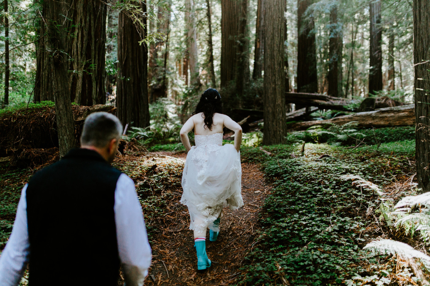 Hannah leads the way up a trail for her elopement.
