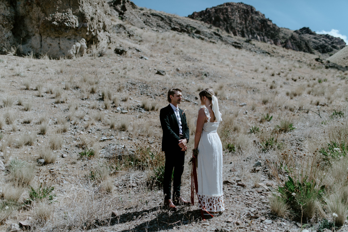 Greyson and Emily at their elopement spot. Elopement photography in the Central Oregon desert by Sienna Plus Josh.