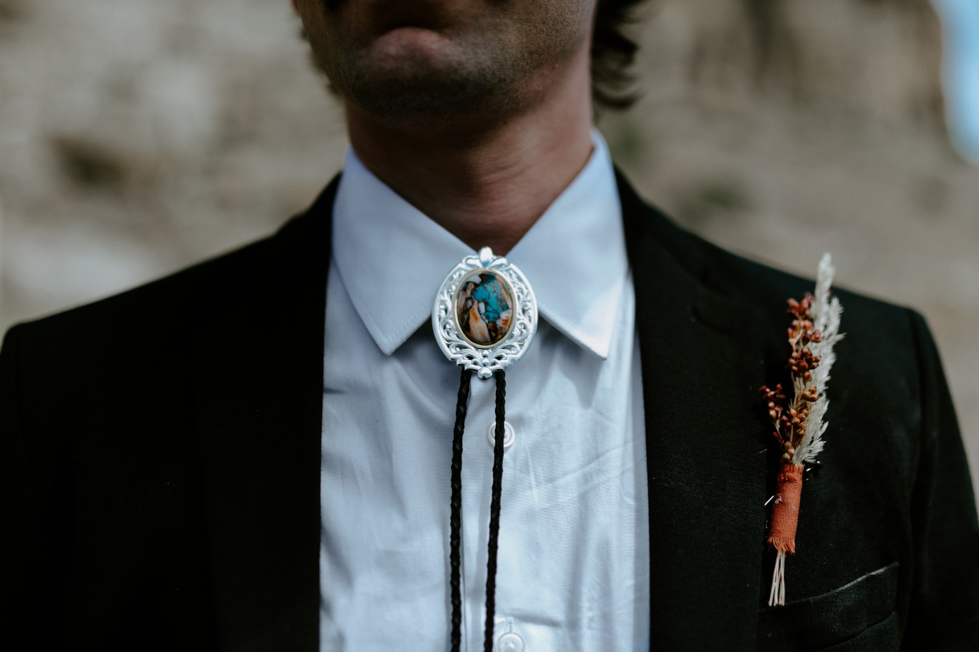 Greyson's bolo tie. Elopement photography in the Central Oregon desert by Sienna Plus Josh.