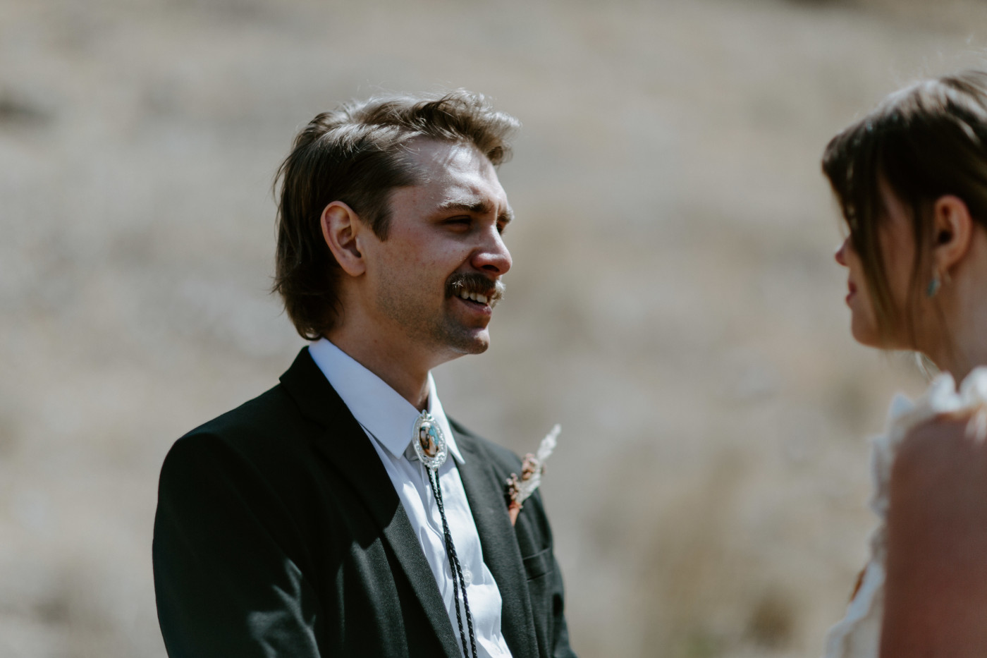 Greyson recites his vows. Elopement photography in the Central Oregon desert by Sienna Plus Josh.