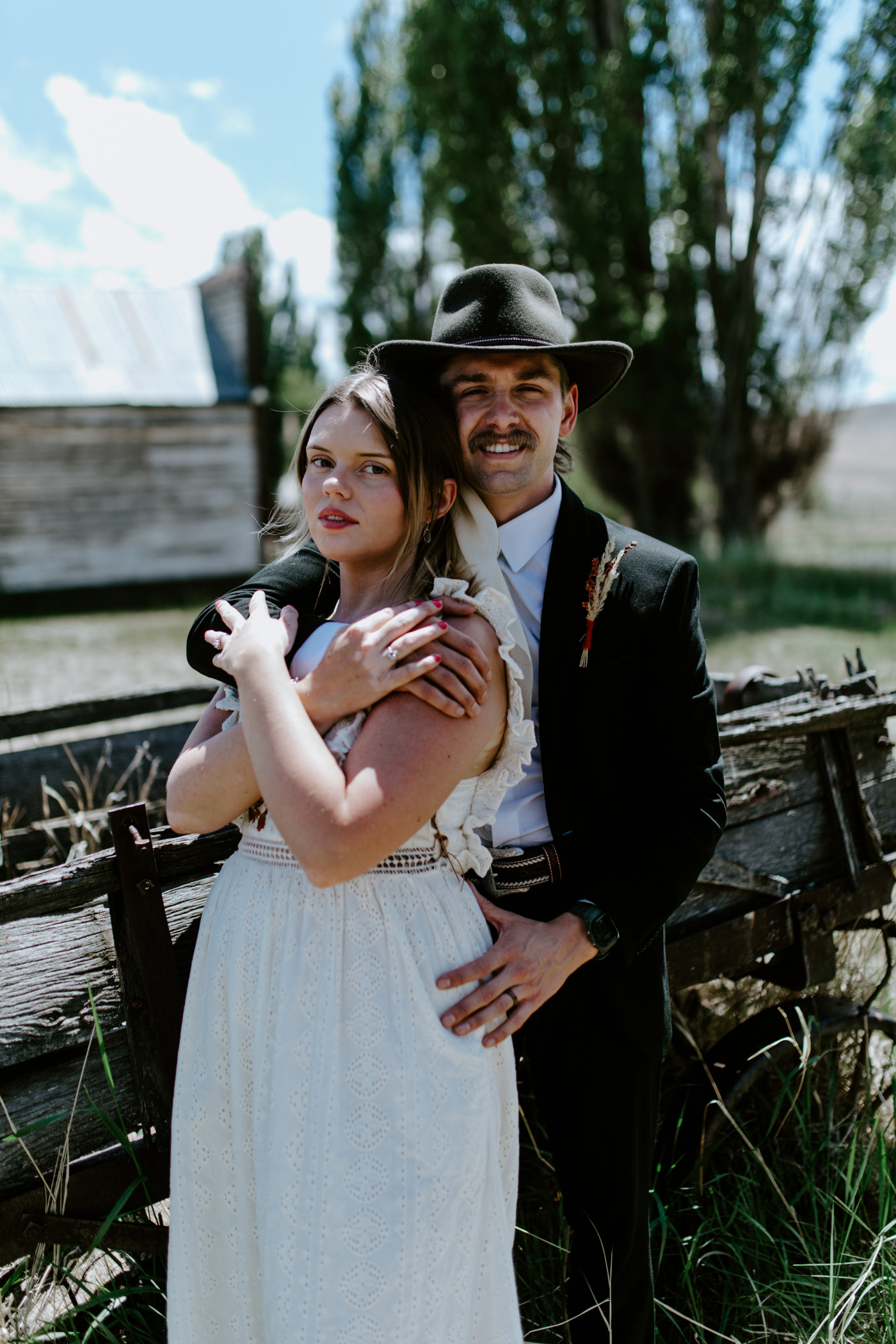 Emily and Greyson hug. Elopement photography in the Central Oregon desert by Sienna Plus Josh.