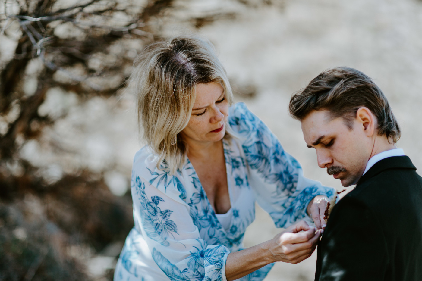 Emily's mom pins Greyson. Elopement photography in the Central Oregon desert by Sienna Plus Josh.