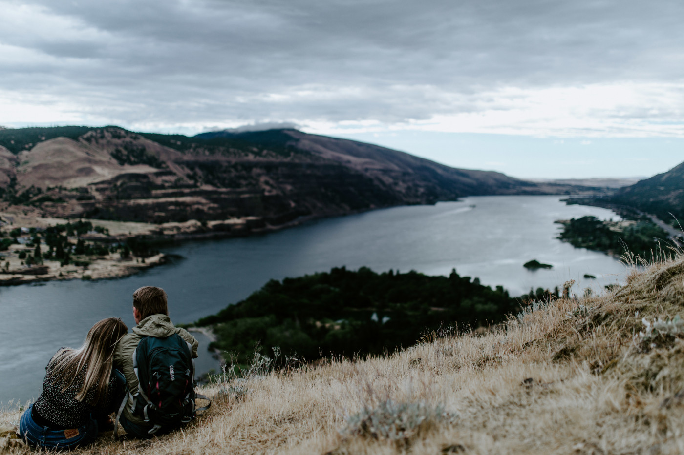 Emily and Greyson look out at the view. Elopement photography at Rowena Crest by Sienna Plus Josh.