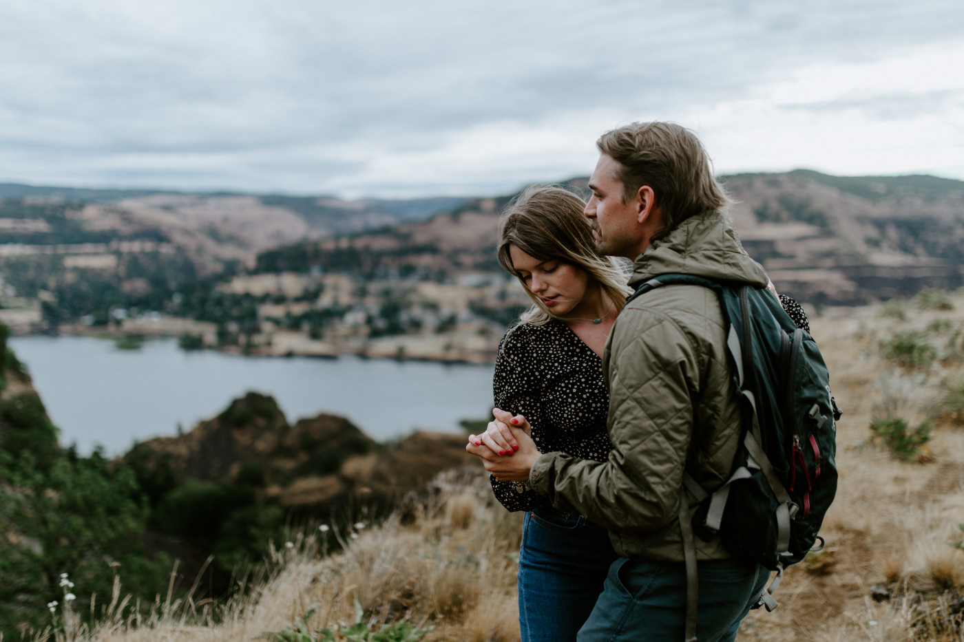 Emily and Greyson stand at the edge of Rowena Crest. Elopement photography at Rowena Crest by Sienna Plus Josh.
