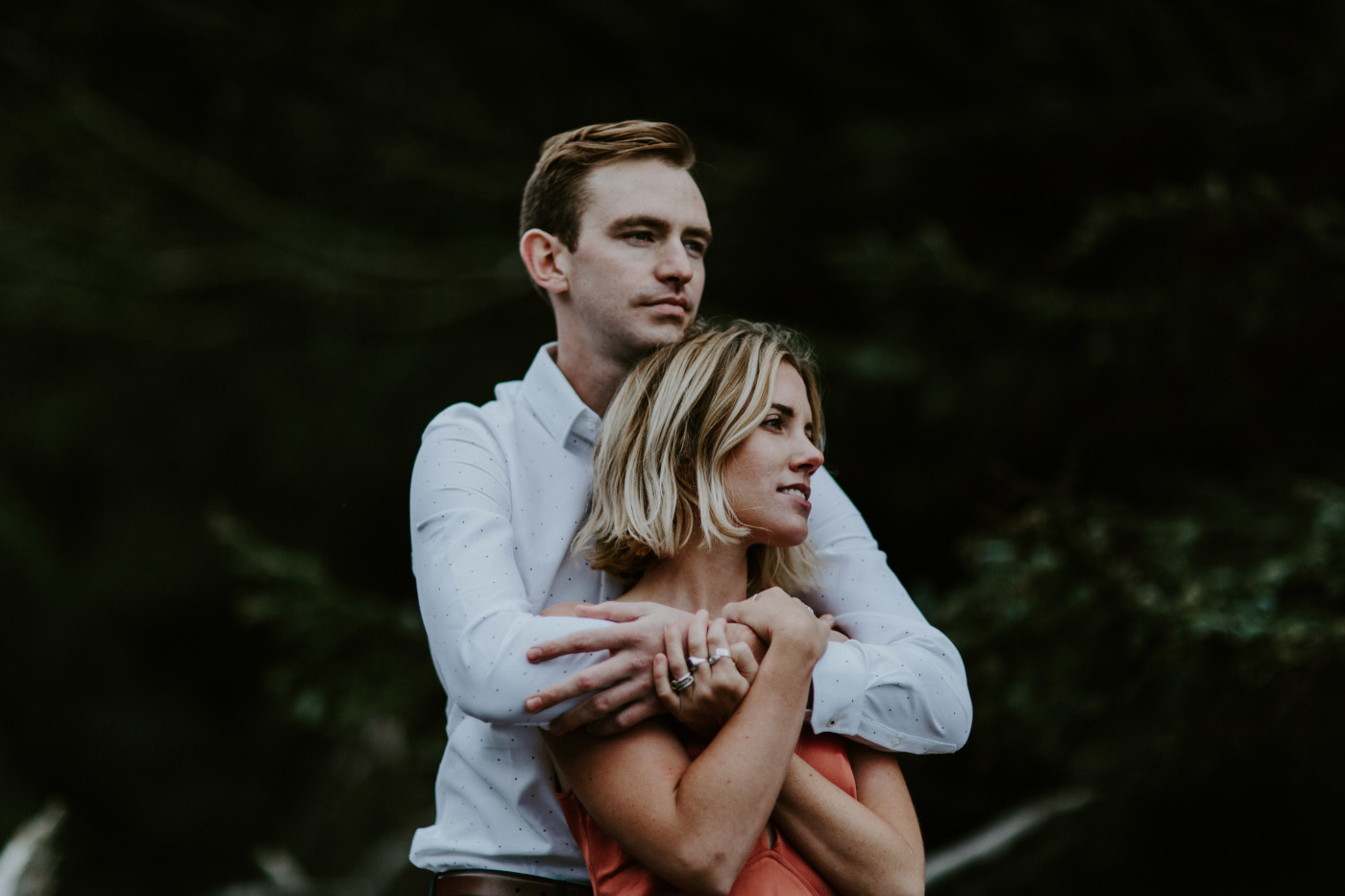 Billy holds Chelsey. Elopement wedding photography at Cannon Beach by Sienna Plus Josh.