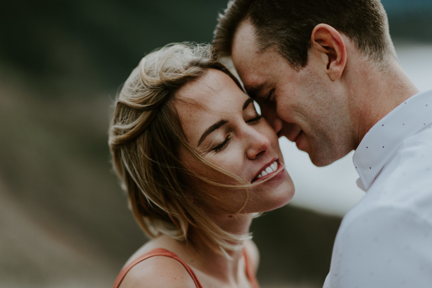 Billy and Chelsey share a moment. Elopement wedding photography at Cannon Beach by Sienna Plus Josh.