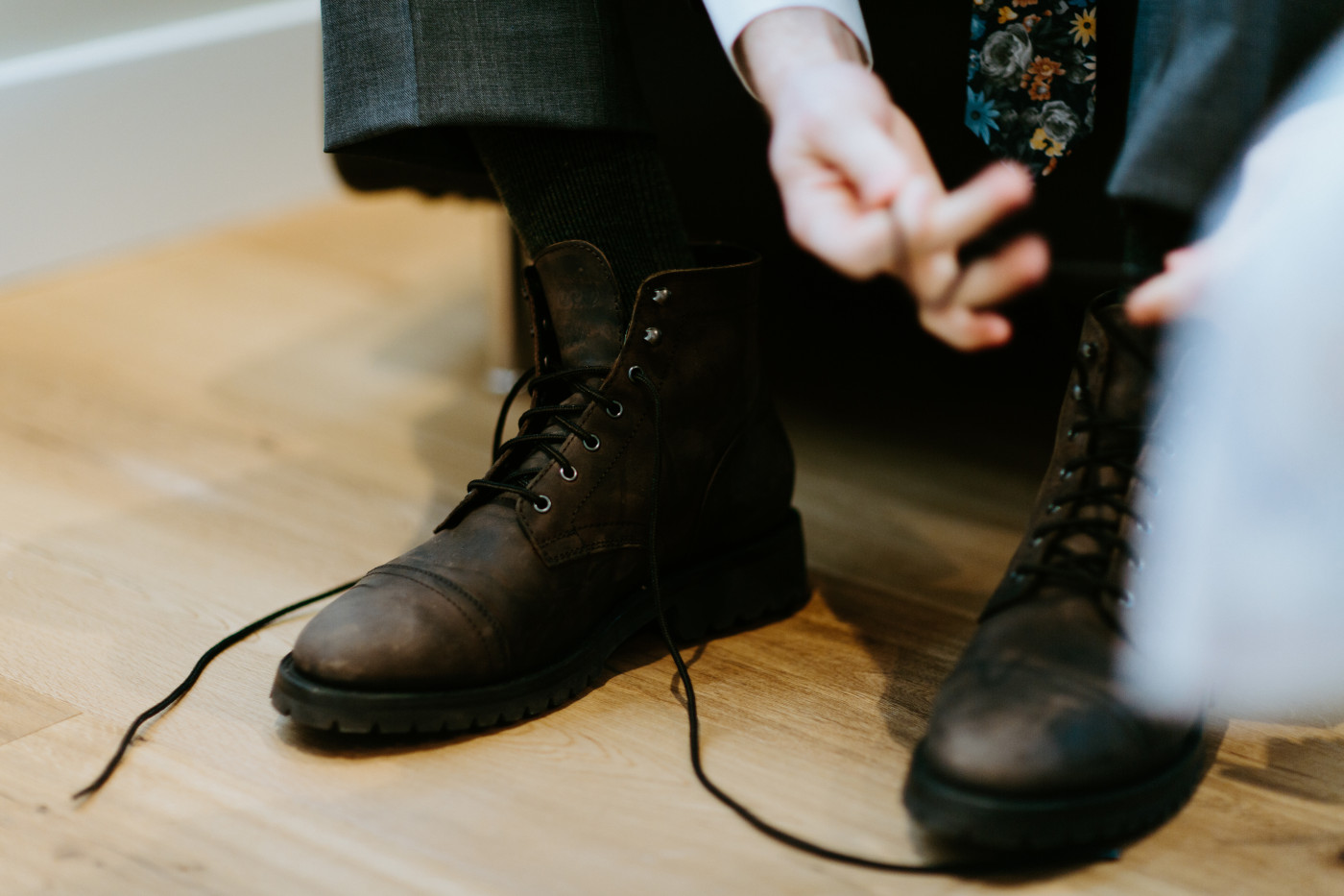 Lennie puts on his shoes. Elopement photography at Columbia River Gorge by Sienna Plus Josh.