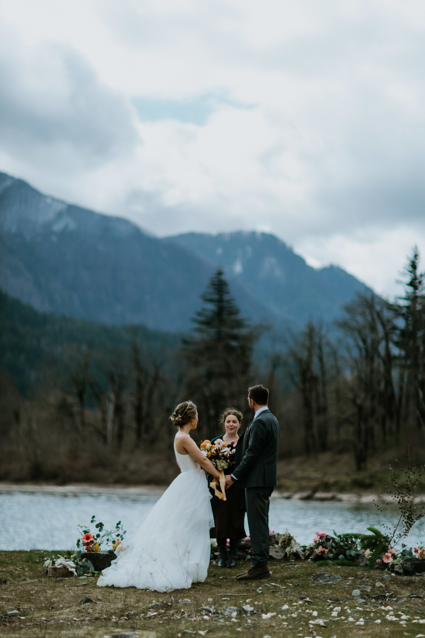 Allison and Lennie smile at their officiant. Elopement photography at Columbia River Gorge by Sienna Plus Josh.