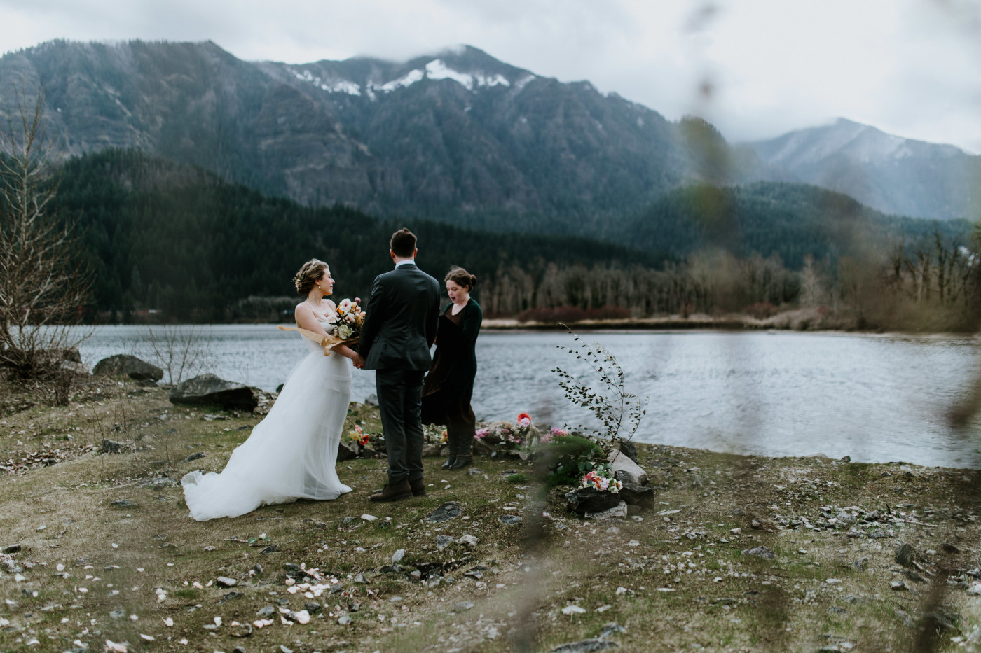 Lennie and Allison stand in front of the water. Elopement photography at Columbia River Gorge by Sienna Plus Josh.