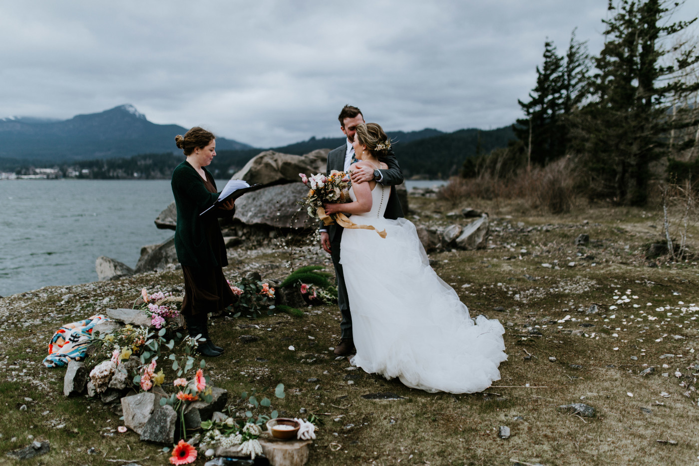Lennie holds Allison to keep her warm. Elopement photography at Columbia River Gorge by Sienna Plus Josh.