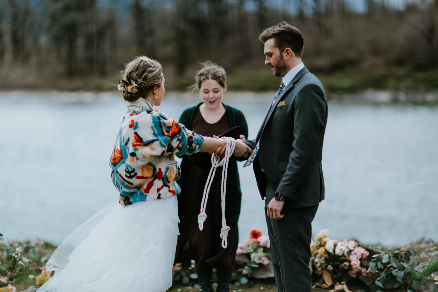 Lennie and Allison doing the hand tying ceremony with rope. Elopement photography at Columbia River Gorge by Sienna Plus Josh.