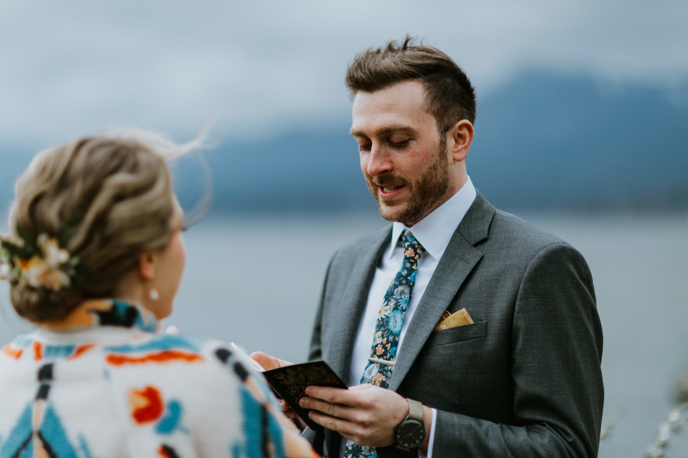 Lennie reads his vows to Allison. Elopement photography at Columbia River Gorge by Sienna Plus Josh.