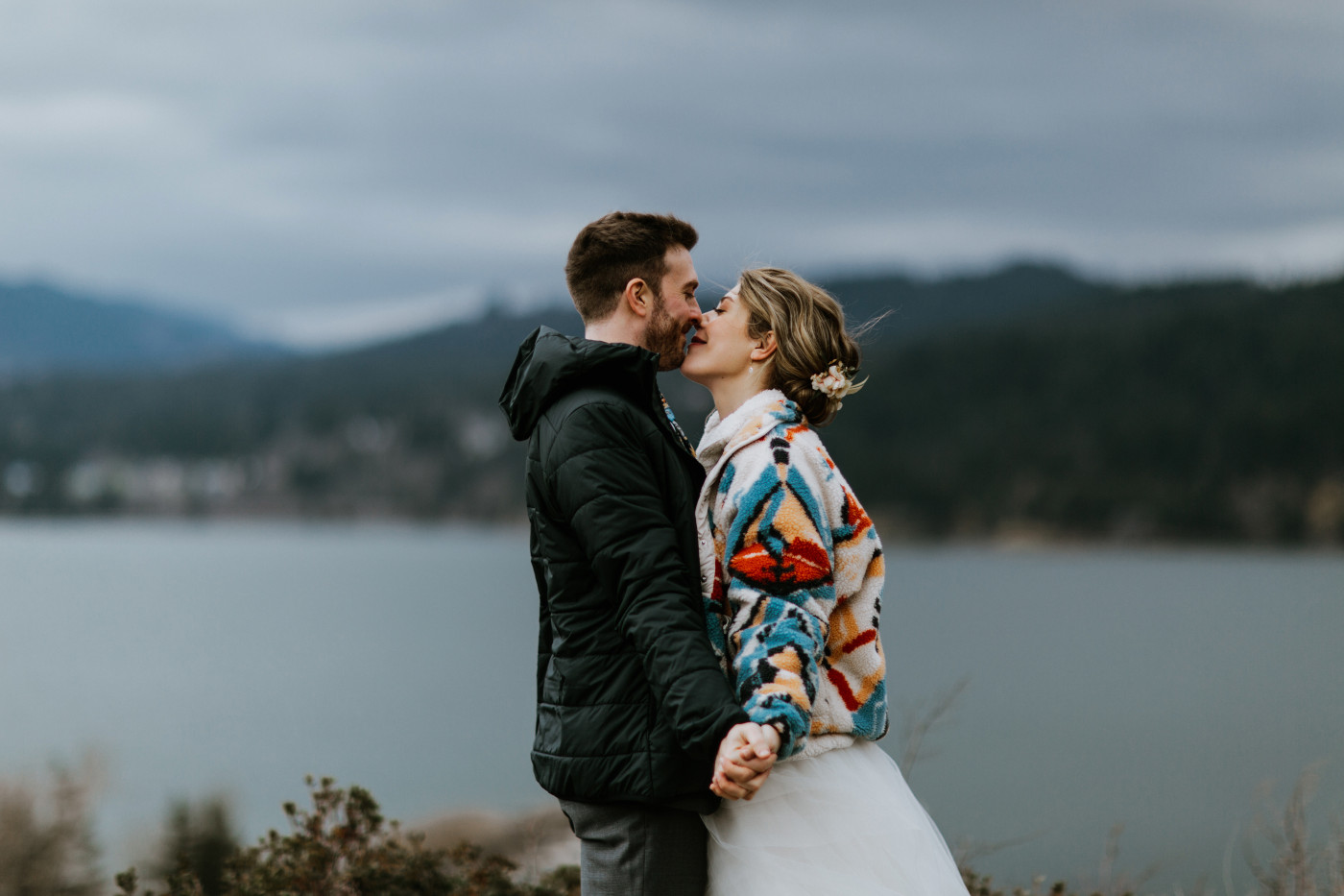Allison and Lennie kiss in the wind. Elopement photography at Columbia River Gorge by Sienna Plus Josh.