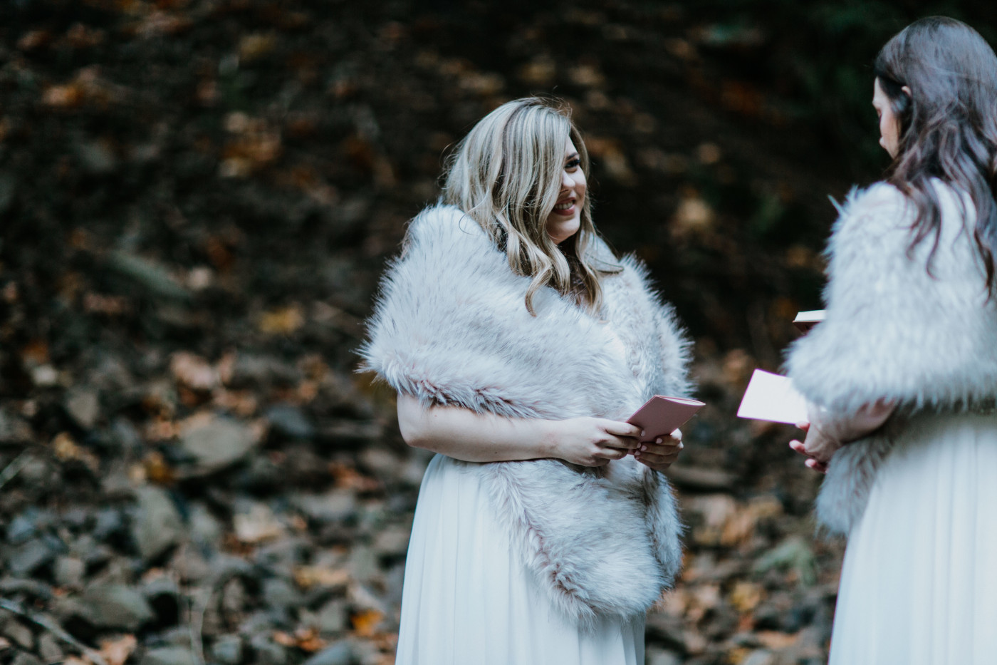 Hayley and Tiffany recite vows. Elopement photography at the Columbia River Gorge by Sienna Plus Josh.