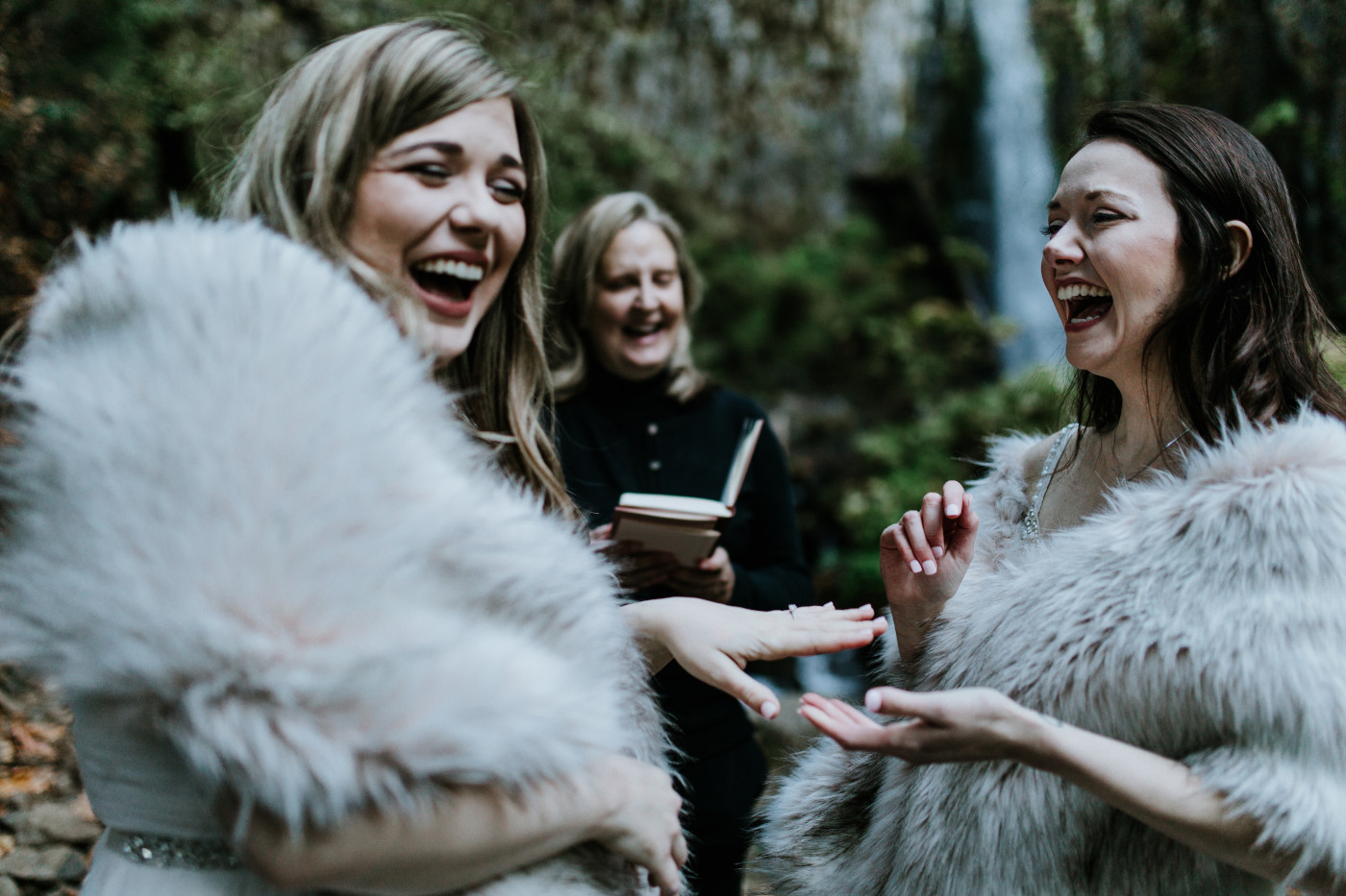 Hayley and Tiffany laugh during their elopement. Elopement photography at the Columbia River Gorge by Sienna Plus Josh.