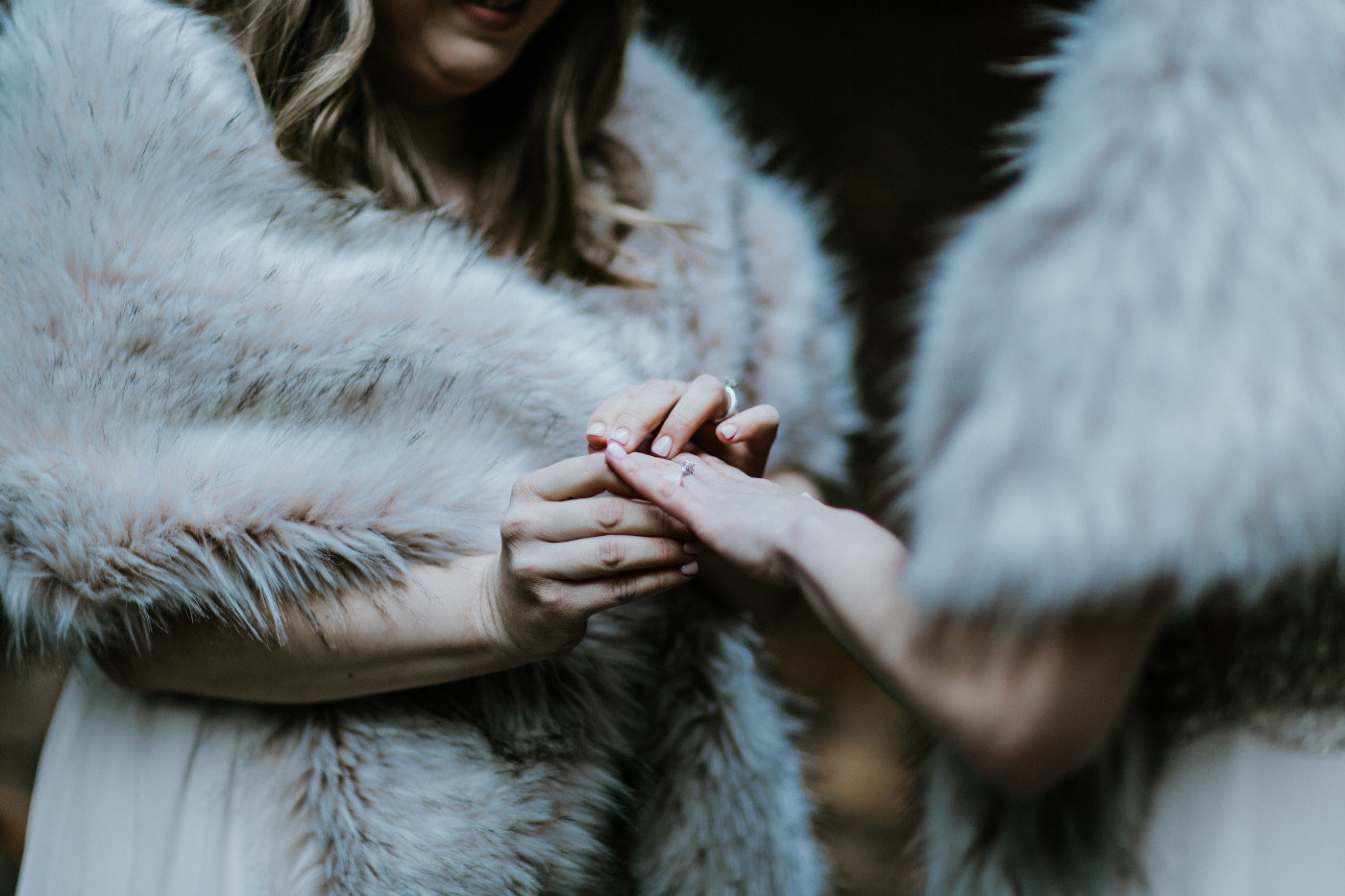 Hayley and Tiffany exchange their rings. Elopement photography at the Columbia River Gorge by Sienna Plus Josh.