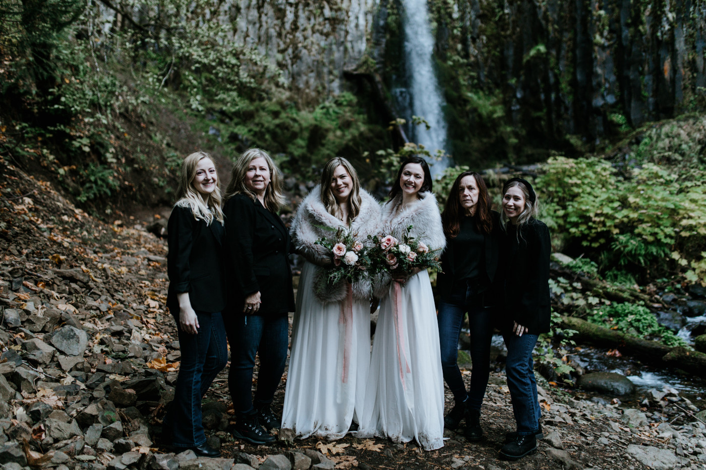 Tiffany and Hayley take a picture with their family and friends. Elopement photography at the Columbia River Gorge by Sienna Plus Josh.