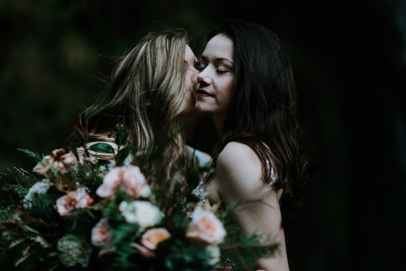Brides share an intimate moment before their elopement. Elopement photography at the Columbia River Gorge by Sienna Plus Josh.