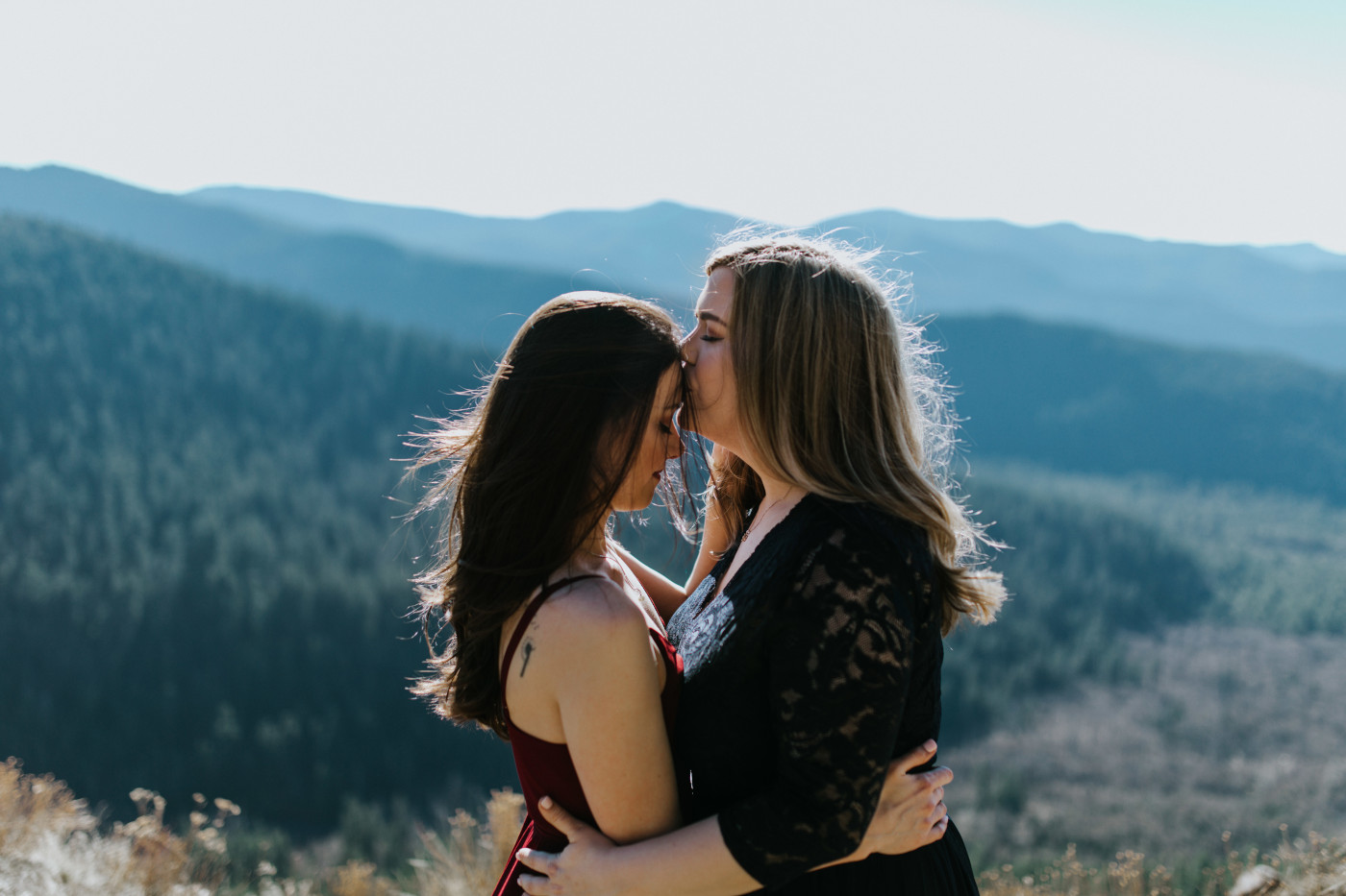 Tiffany and Hayley stand together. Elopement photography at the Columbia River Gorge by Sienna Plus Josh.