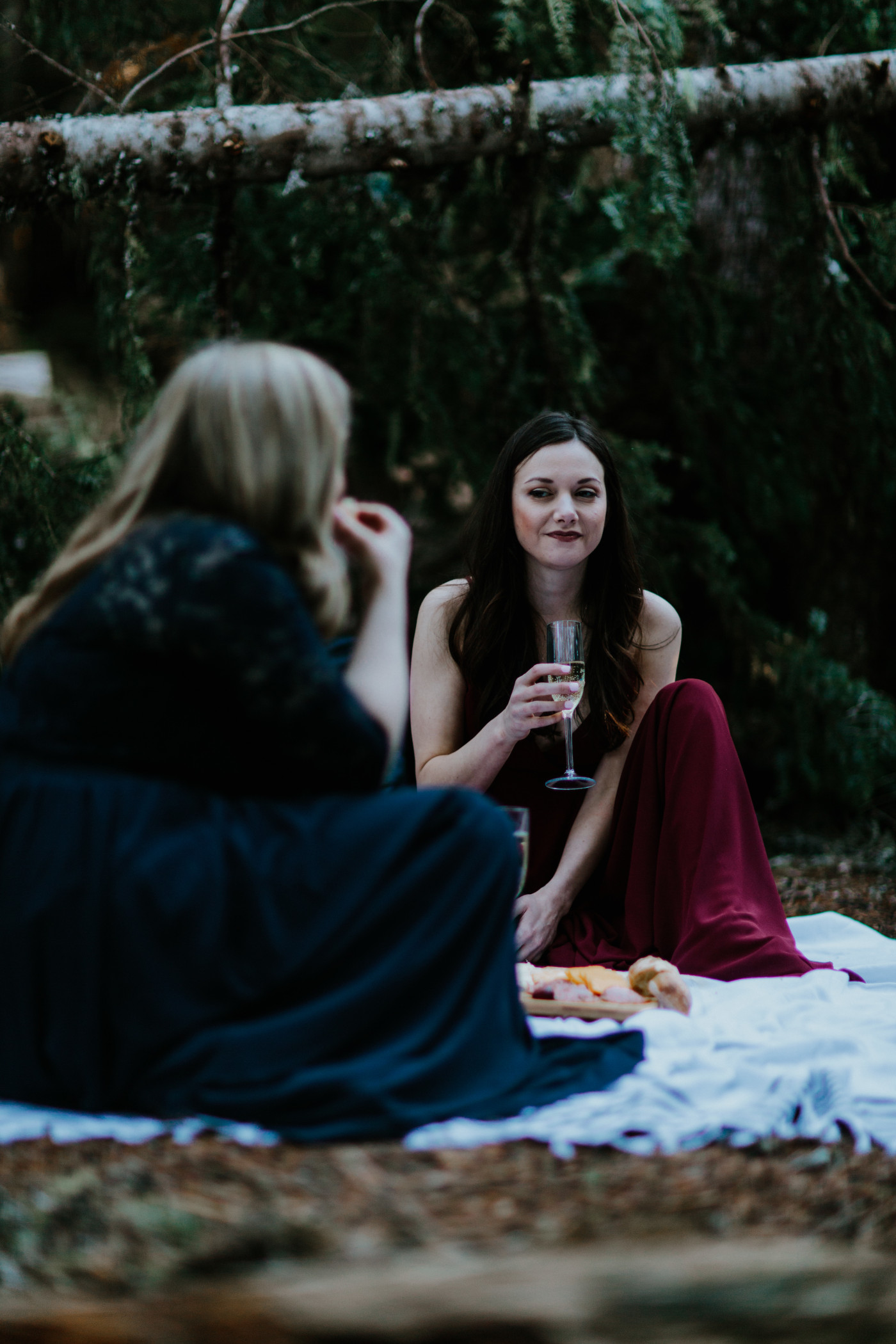 Tiffany and Hayley have a private picnic in Mt Hood woods. Elopement photography at the Columbia River Gorge by Sienna Plus Josh.