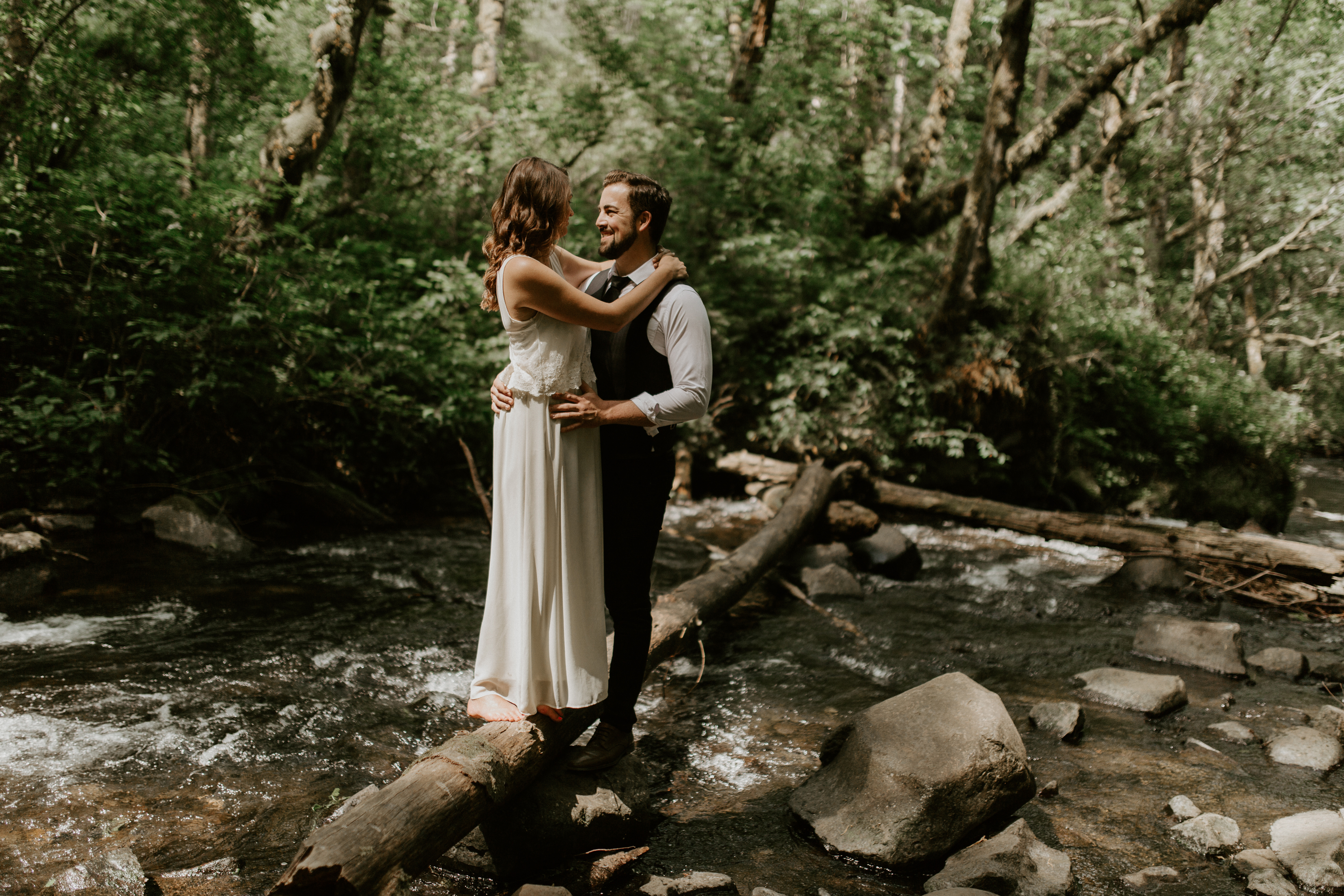 Emily and Josh hug in the Columbia River Gorge, Oregon. Elopement photography in Portland Oregon by Sienna Plus Josh.
